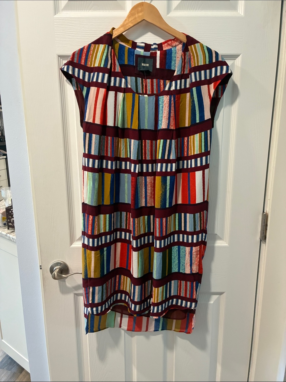 Anthropologie’s NIC+ZOE Multicolor Stripe Shift Dress with Burgundy Bands